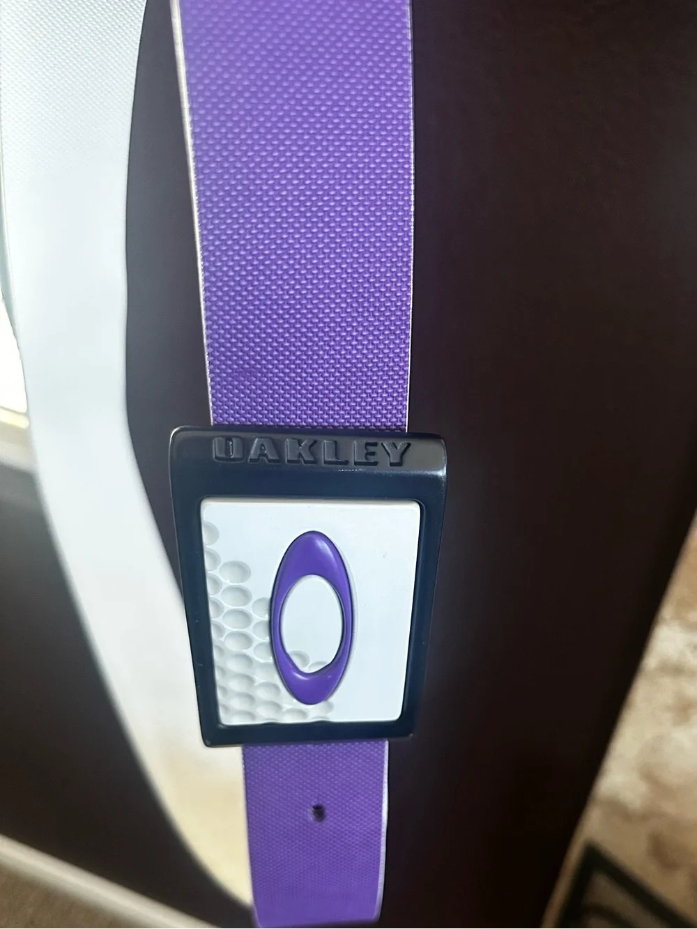 Oakley Belt Buckle with Purple Belt.